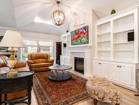 50" 4K Art Frame TV with streaming services, 5.1 surround sound, window treatment and Savant control system.