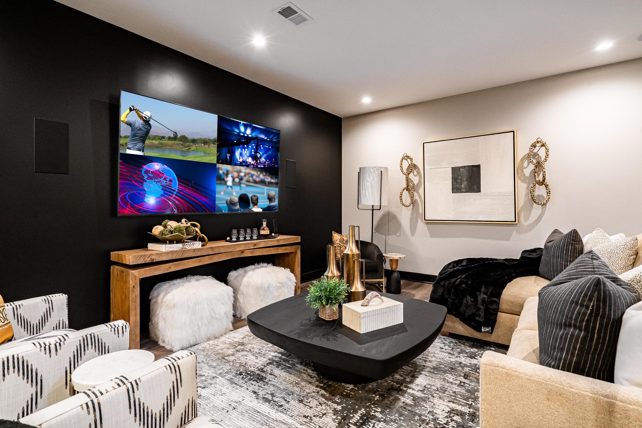 AUTOMATED LIVING LLC 85" 4K Sony display with 5.1 surround sound, streaming services, Savant video tiling and control system.