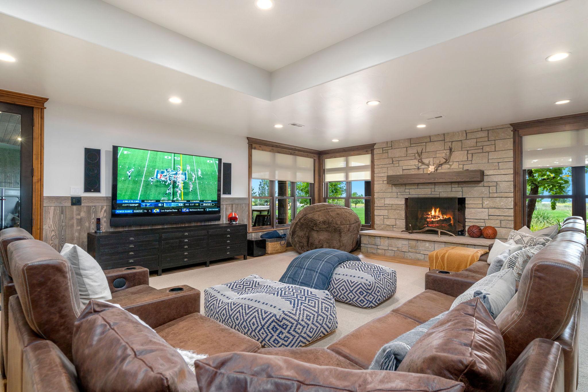 Harmonic Series Includes: DMF Lighting; KEF in-wall speakers; Sony TV; Savant Soundbar; Lutron Triathlon Shades