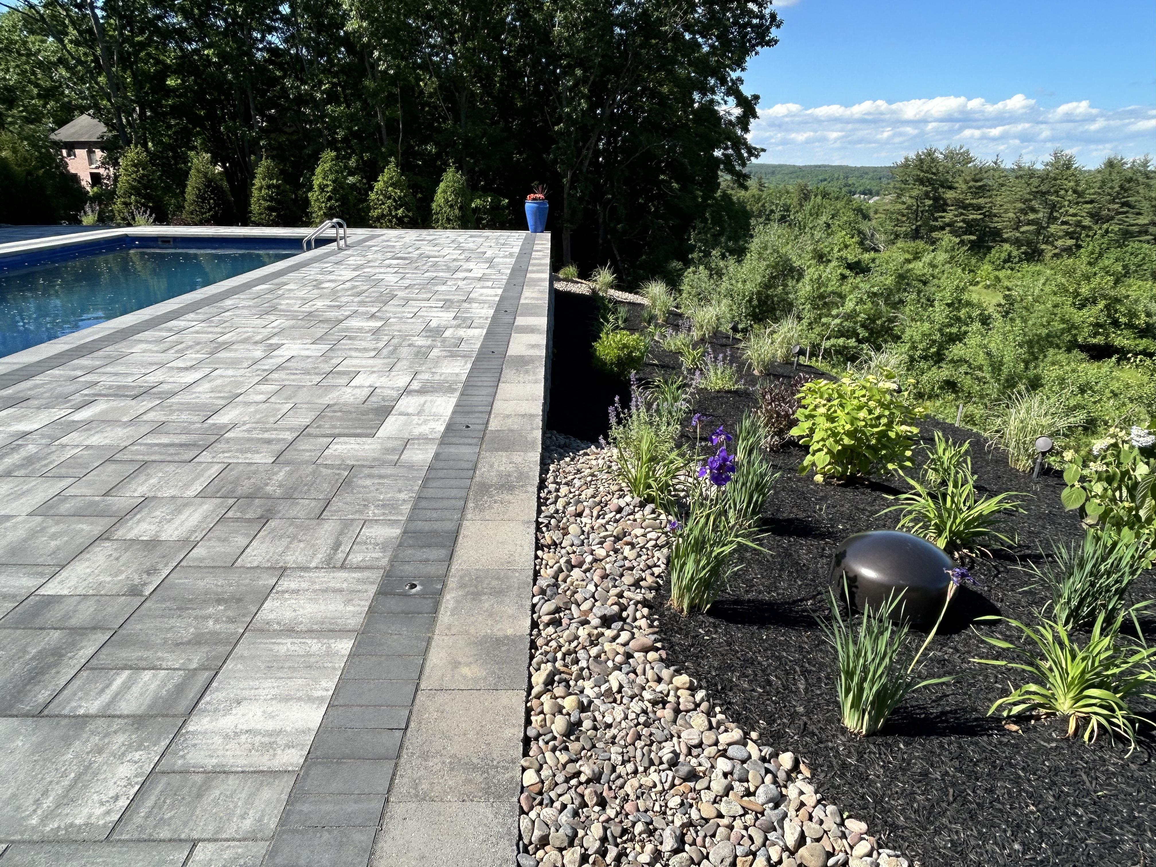 Hippo's This backyard features a Sonance Landscape system and Coastal Source lighting.
