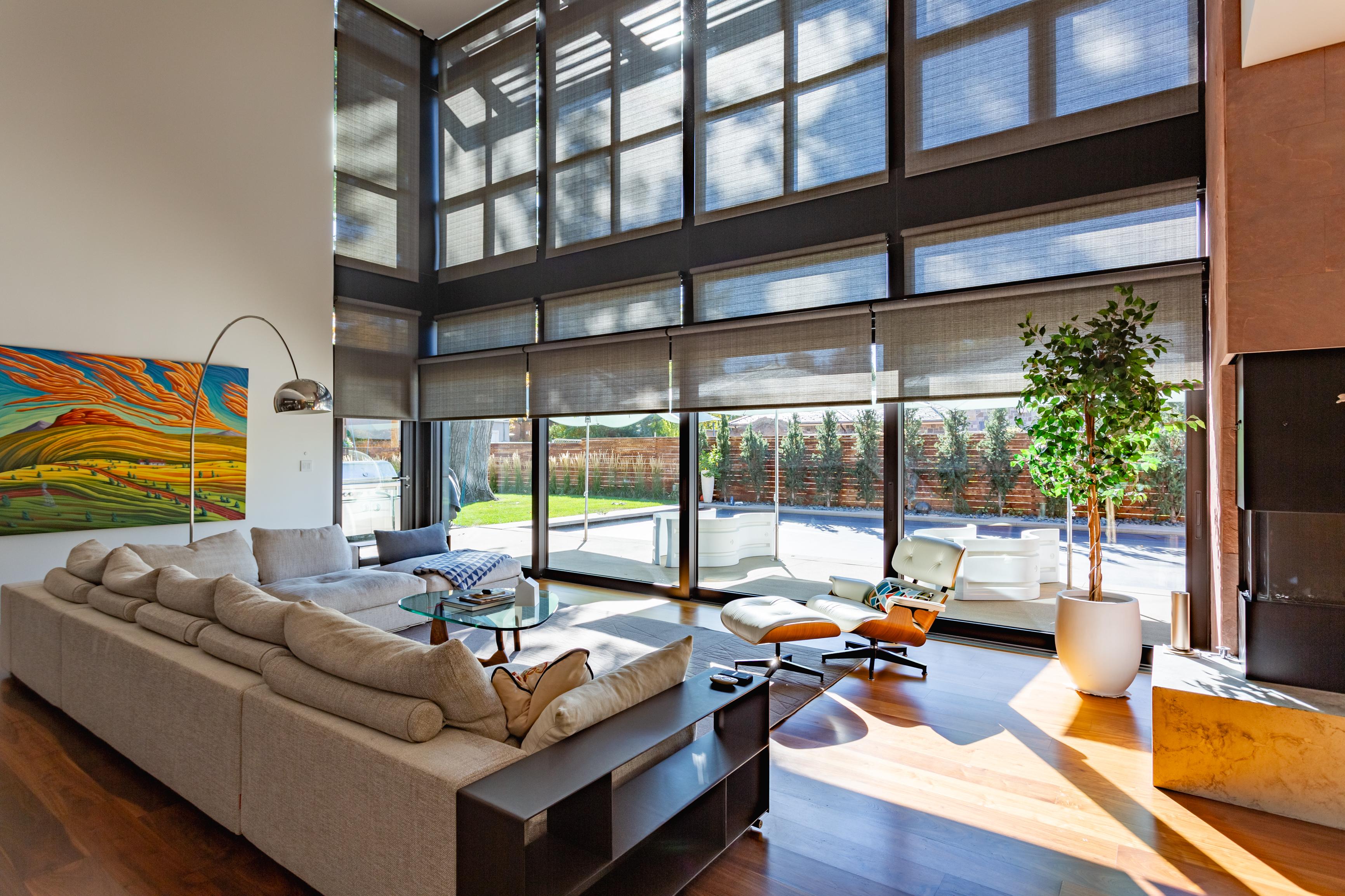 Aurum This room featured a ton of automated designer window shades easily controlled from a beautiful keypad.