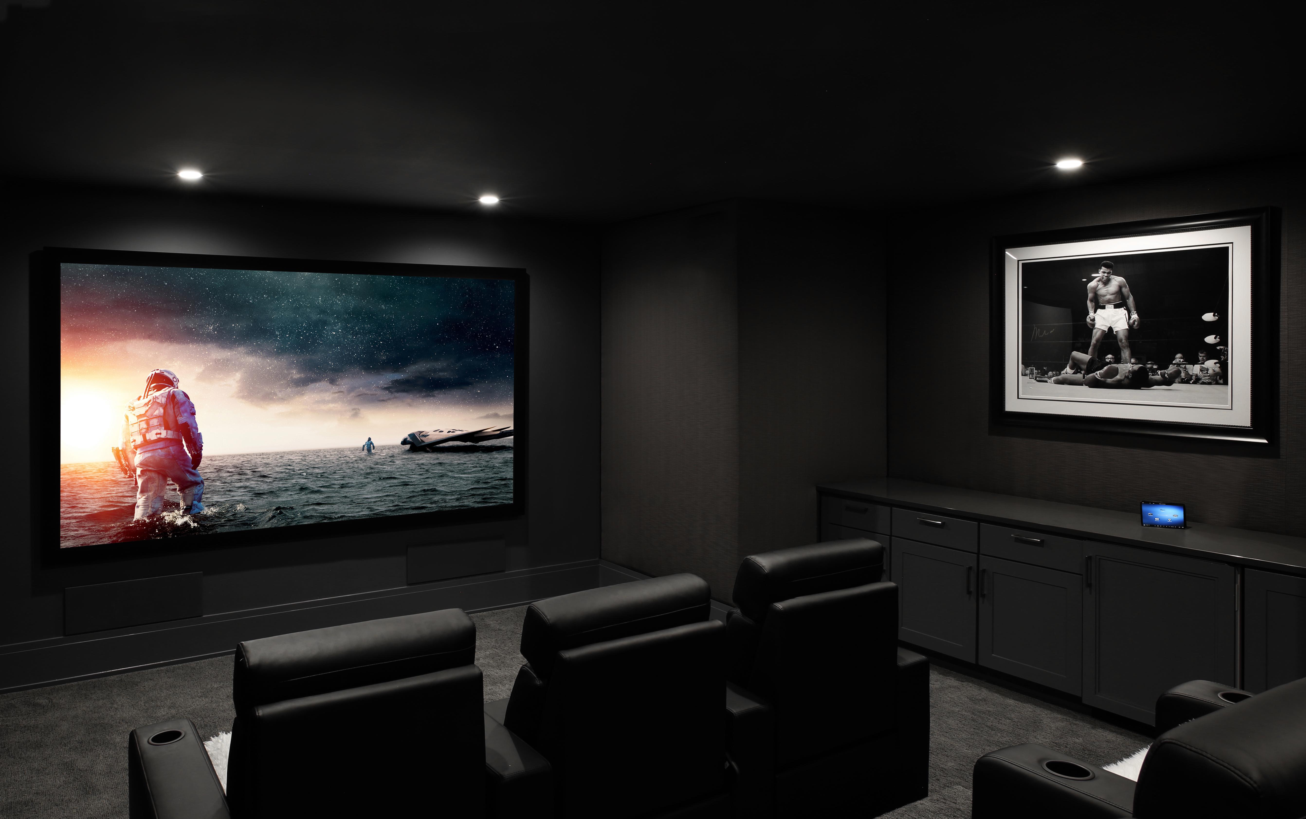 PREMIERE SYSTEMS DESIGN Custom home theater in Bridgehampton, NY. Dragonfly screen, Sony projector, Salamander tiered seating.