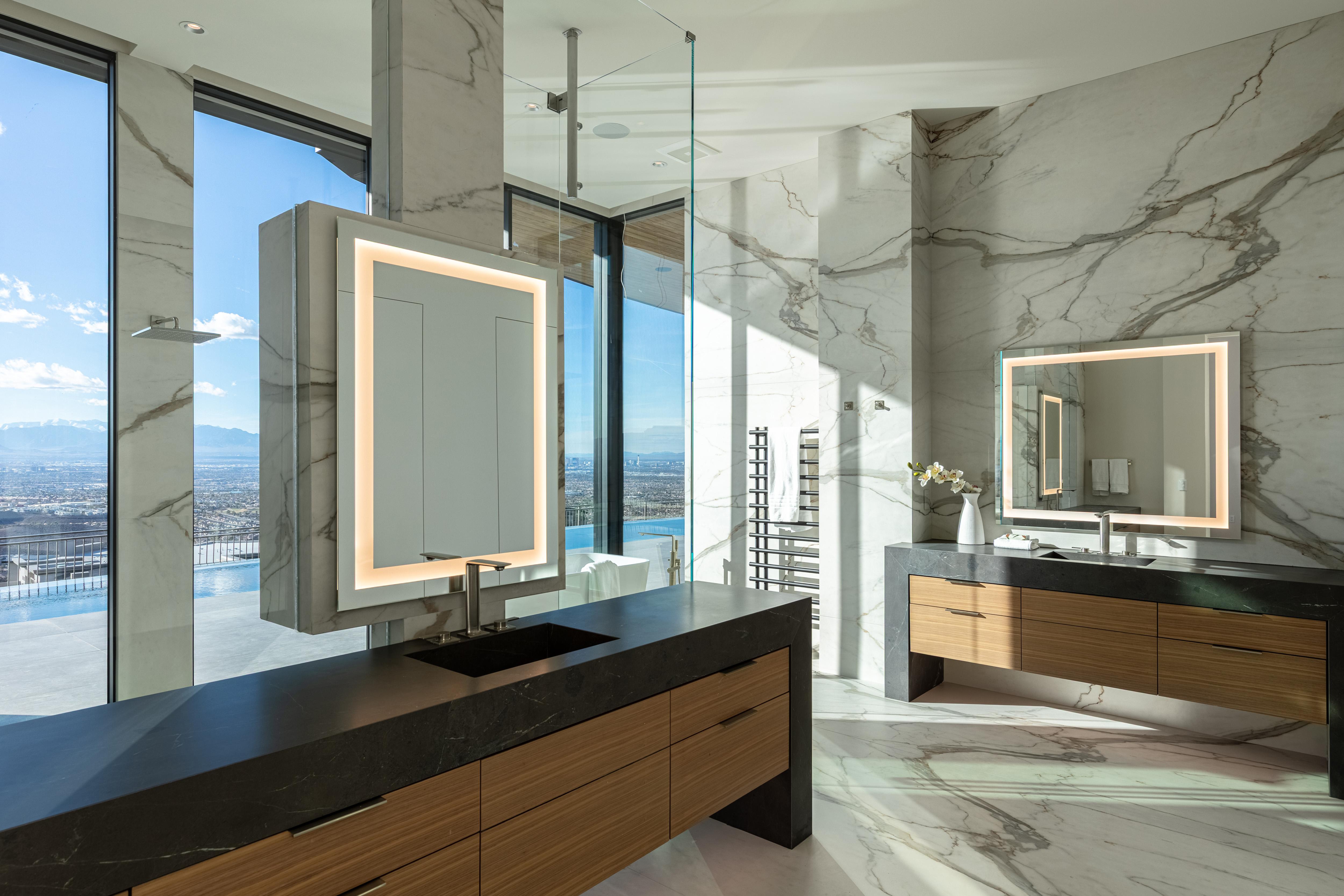 Séura Séura Allegro lighted mirrors bring refined illumination and quiet luxury to a modern bath.