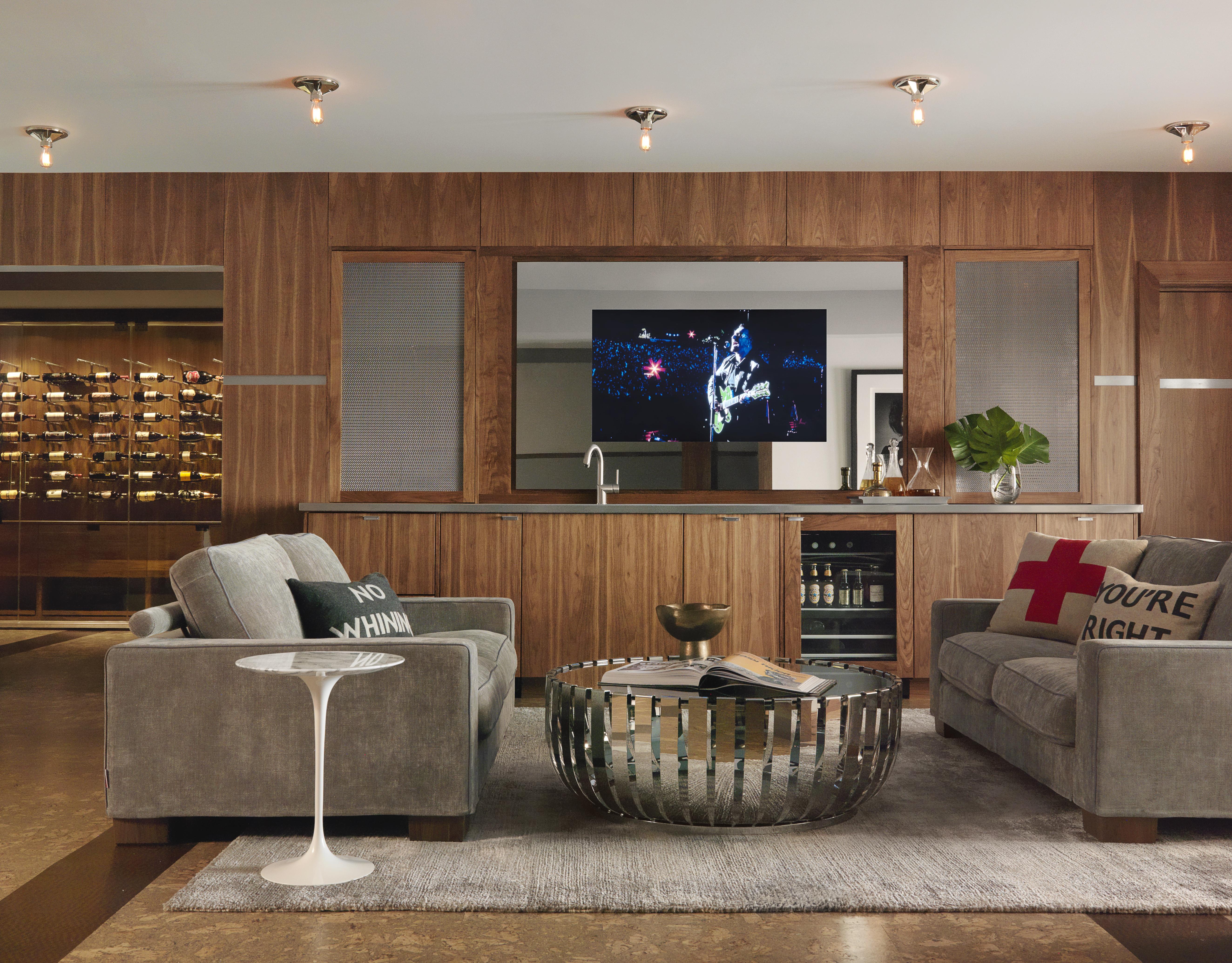 Walbrandt Electric & Technology Seura Mirrored TV behind bar